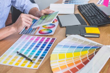 Design team at SPCoccoz reviewing product samples and sketches